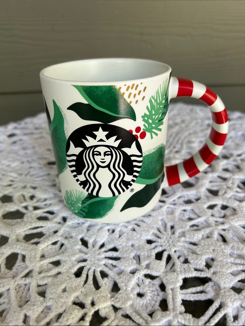 Starbucks White Mug with Green Leaf Motif and Red-White Striped Handle